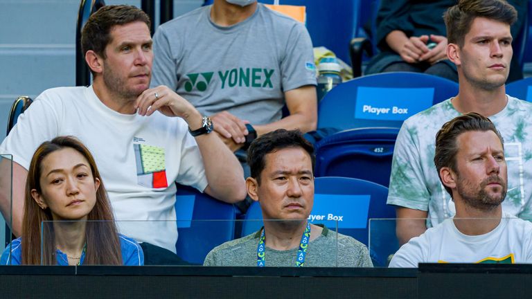 Yutaka Nakamura (center front), strength coach and Wim Fissette (front right), coach support Naomi Osaka of Japan in her second round match against Madison Brengle of the United States during day three 2022 Australian Open Melbourne Park on January 19, 2022 in Melbourne, Australia. (Photo by Andy Cheung/Getty Images)